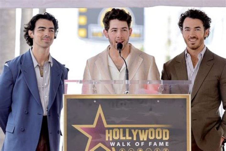 Dazzles In London With Nick Jonas – Hollywood Life