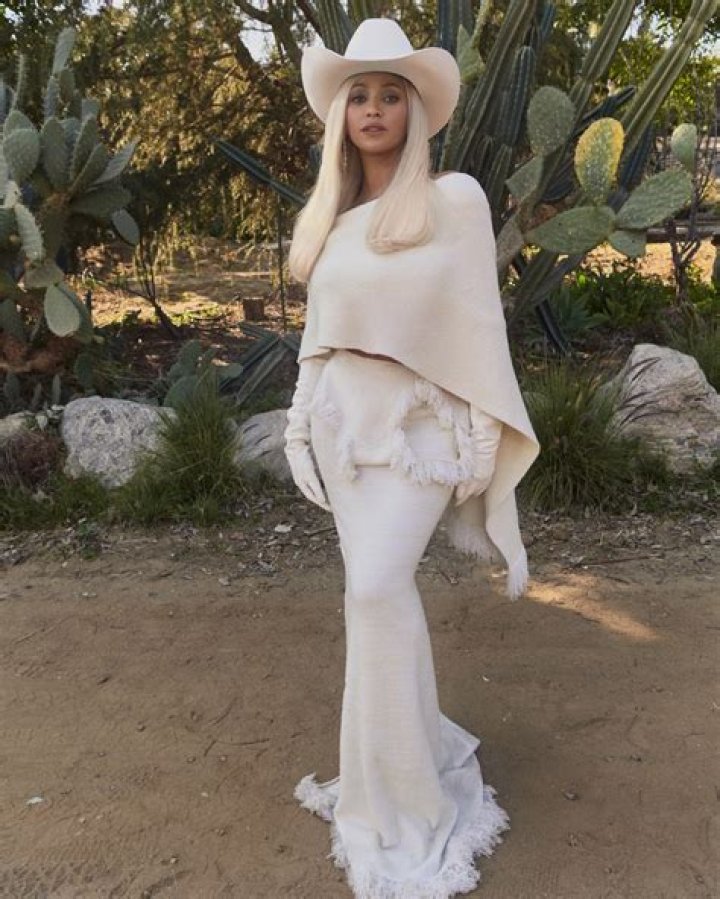 Kim Kardashian Looks Like A Sexy Cowgirl In White Bikini & Chaps: ‘All Dressed Up With Nowhere To Go’