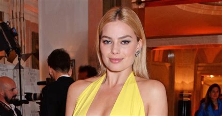 Margot Robbie Rocks Tiny Yellow Bikini On Yacht: Photos – Hollywood Life