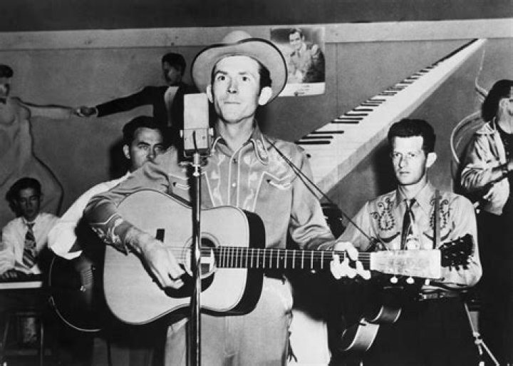 Pics of the Iconic Country Music Legend – Hollywood Life
