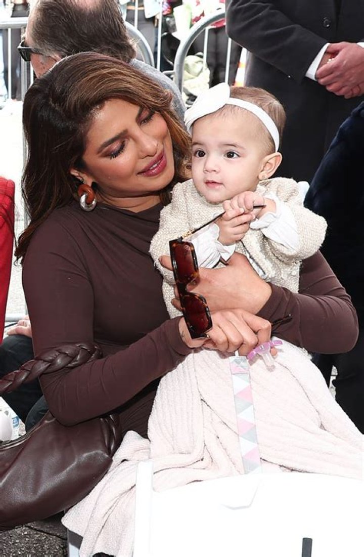Priyanka Chopra Snuggles Up to Nick Jonas & Shares New Photos of Daughter Malti Marie