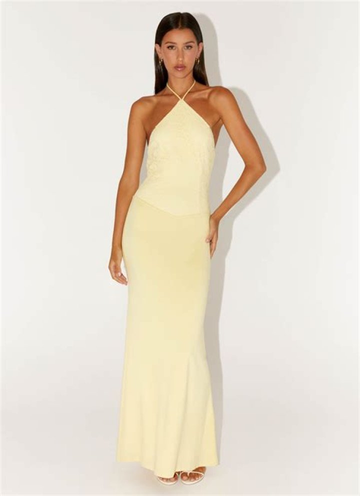 Sarah Hyland Looks So Cute In Bright Yellow Halter Dress