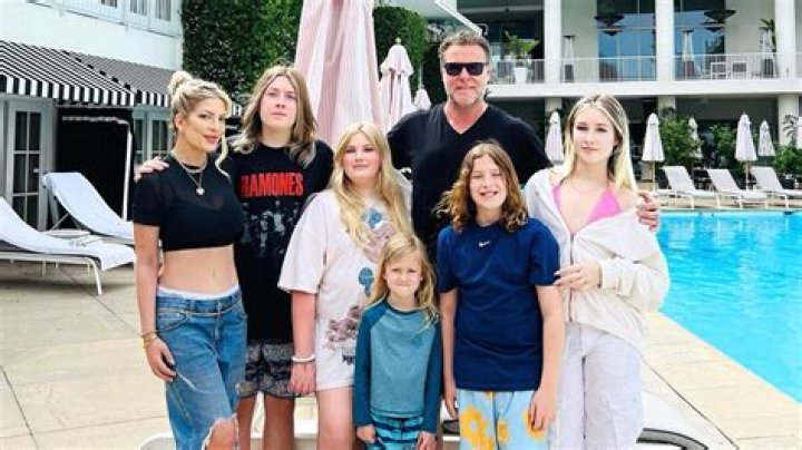 Tori Spelling Wears Black Sports Bra On The Beach Amid Separation From Dean McDermott