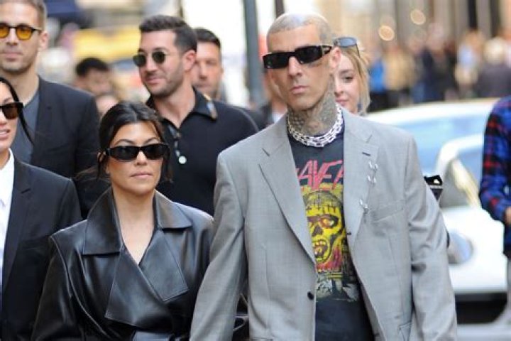 Travis Barker Grabs Kourtney Kardashian’s Butt As She Makes Out With Him In A Bikini: Photo